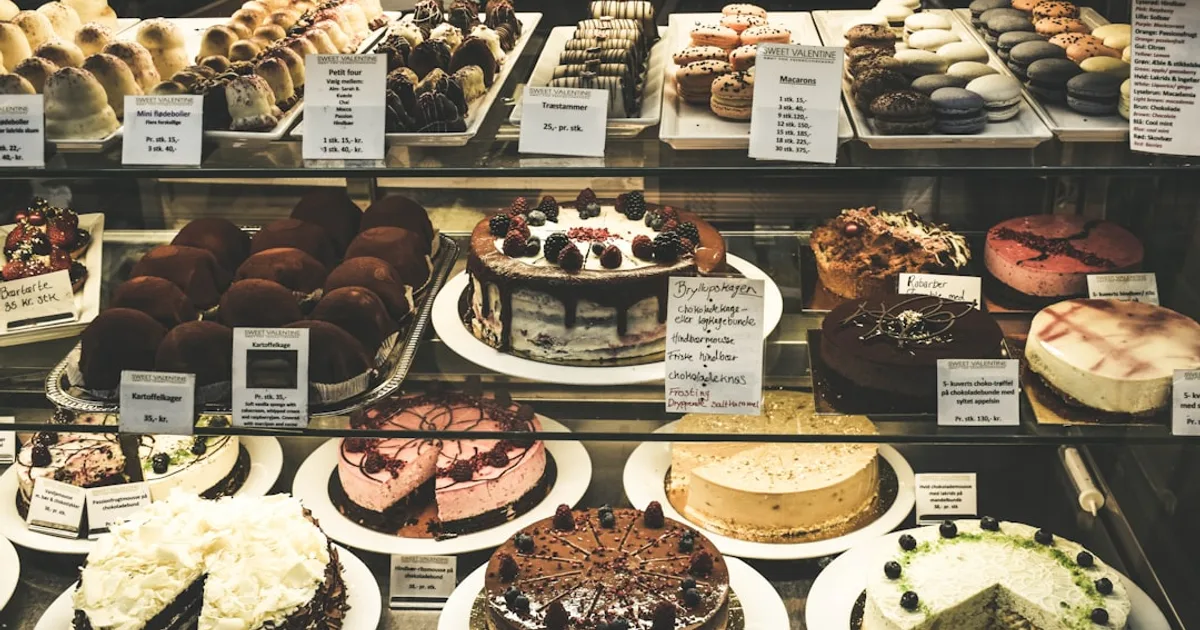 Cakes and pastries on a bakery shelf in a UAE supermarket