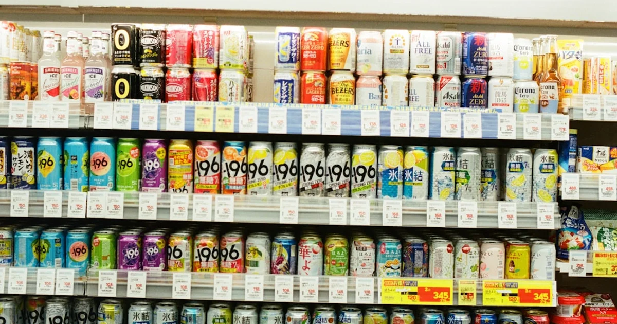 Finnish supermarket beverage aisle with soft drinks, juices and energy drinks