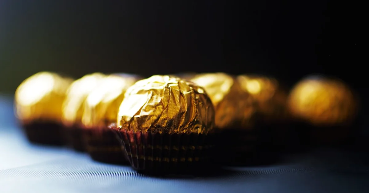 Italian chocolate selection including Ferrero Rocher and Perugina Baci chocolates