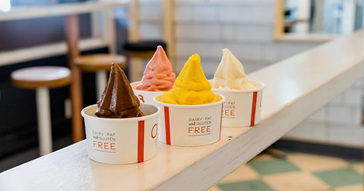Japanese convenience store freezer with ice cream cups and mochi ice cream