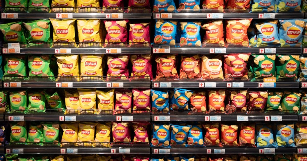 Bags of savoury snacks and chips on a Philippine supermarket shelf