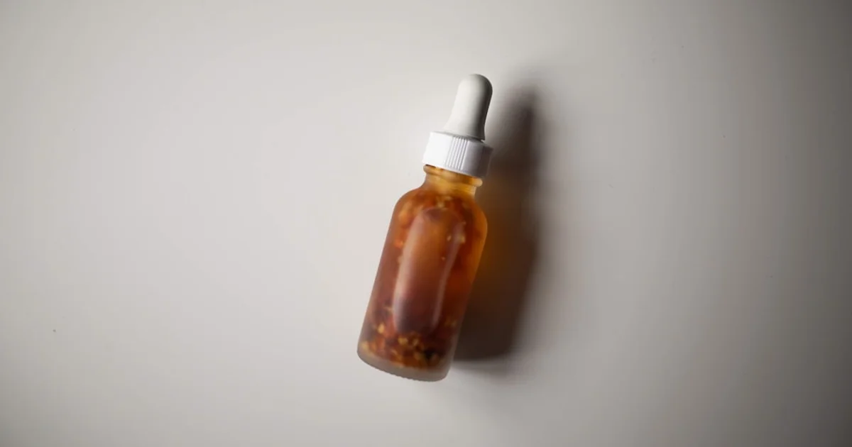 Skincare serum dropper bottle on a bathroom shelf — halal check of The Ordinary Multi-Peptide Eye Serum