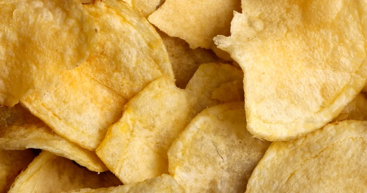 Bag of cheese-flavoured wavy crisps similar to Walkers Spanish Queso